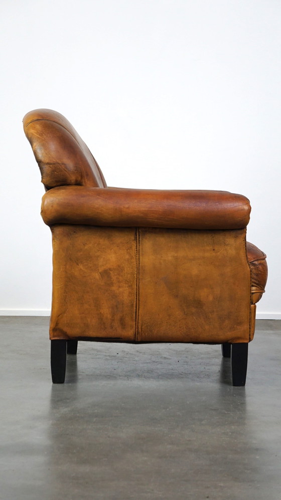 Image 1 of Vintage schapenleren fauteuil/ armchair met een fijne zit