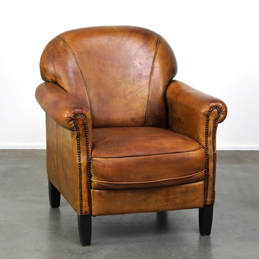 Vintage schapenleren fauteuil/ armchair met een fijne zit