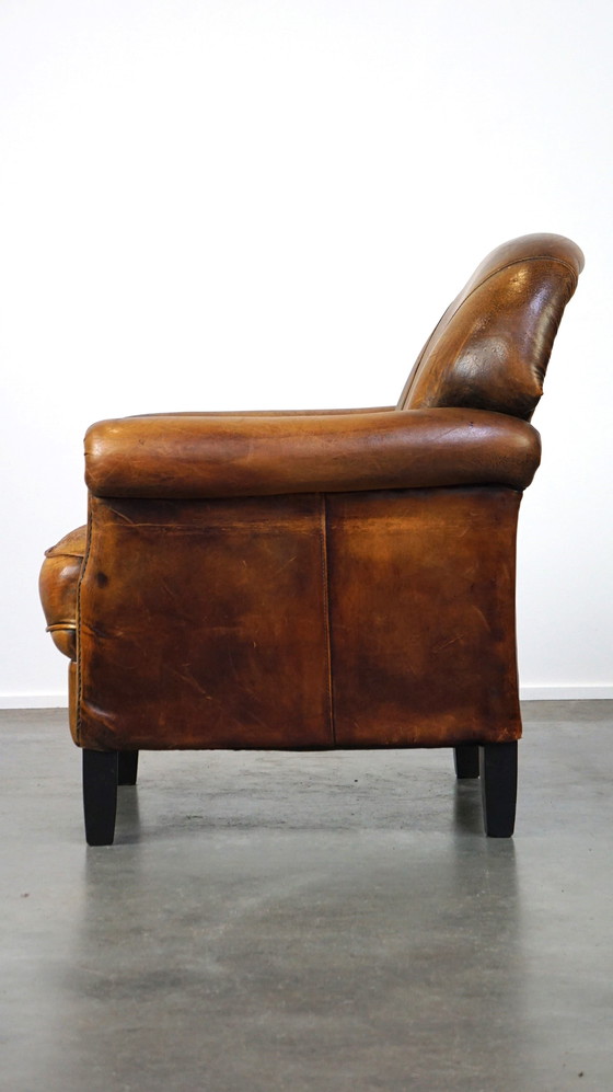 Image 1 of Vintage schapenleren fauteuil/ armchair met een fijne zit