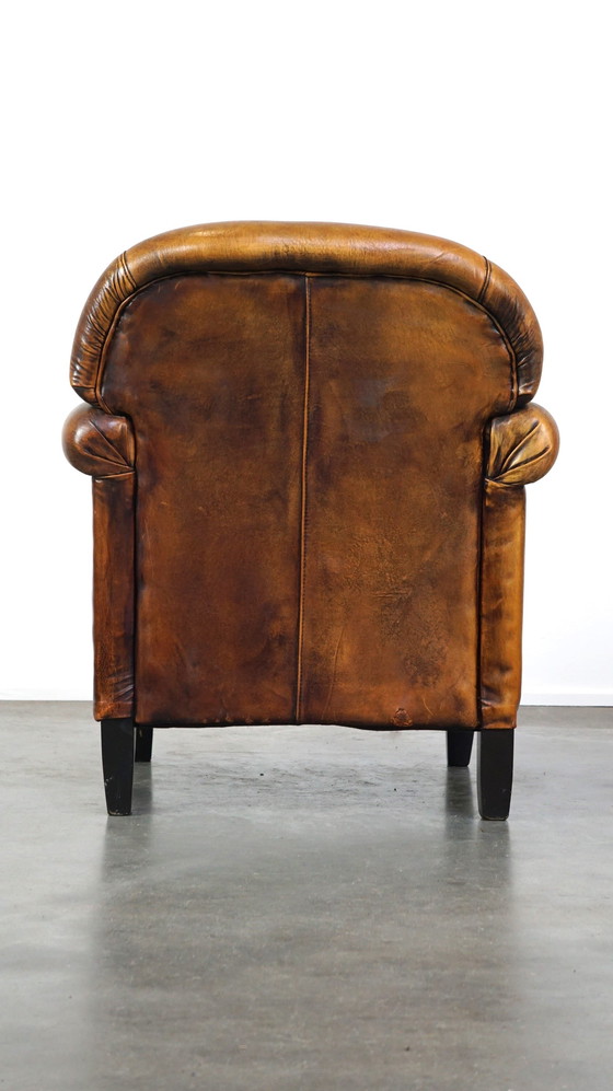 Image 1 of Vintage schapenleren fauteuil/ armchair met een fijne zit