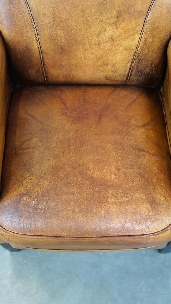 Image 1 of Vintage schapenleren fauteuil/ armchair met een fijne zit