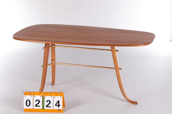 Image 1 of Vintage Salontafel met 3 poten en messing details Scandinavie.