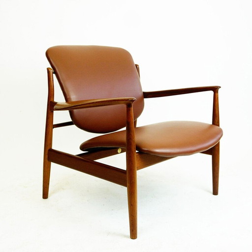 Deense vintage teakhouten en bruin leren fauteuil van Finn Juhl voor France and Son