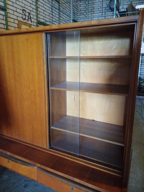 Image 1 of Midcentury wandkast met glazen schuifdeuren