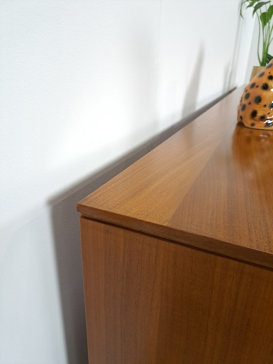 Image 1 of Lang Teak Dressoir Met Lades En Klepkast