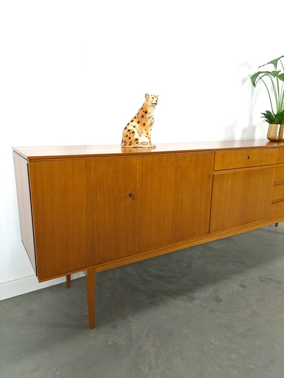 Image 1 of Lang Teak Dressoir Met Lades En Klepkast