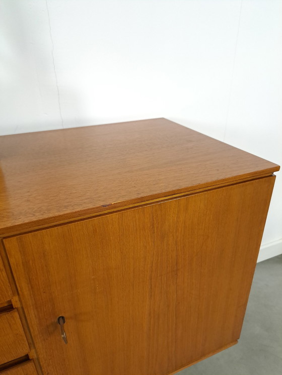 Image 1 of Lang Teak Dressoir Met Lades En Klepkast