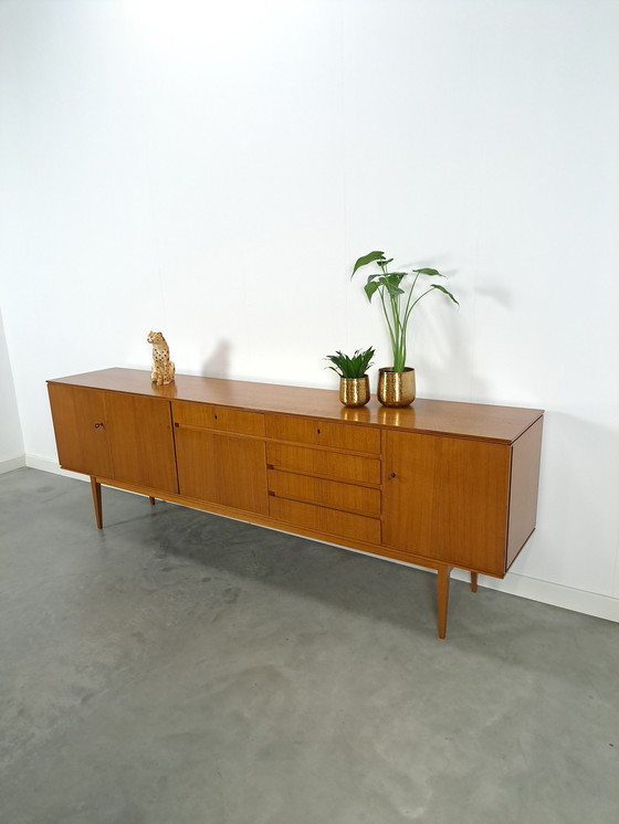 Image 1 of Lang Teak Dressoir Met Lades En Klepkast