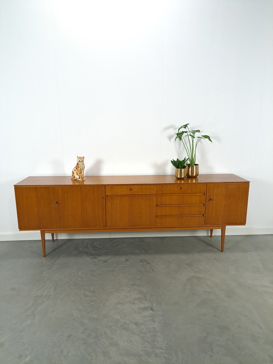 Image 1 of Lang Teak Dressoir Met Lades En Klepkast