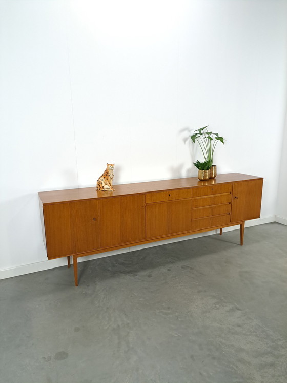 Image 1 of Lang Teak Dressoir Met Lades En Klepkast