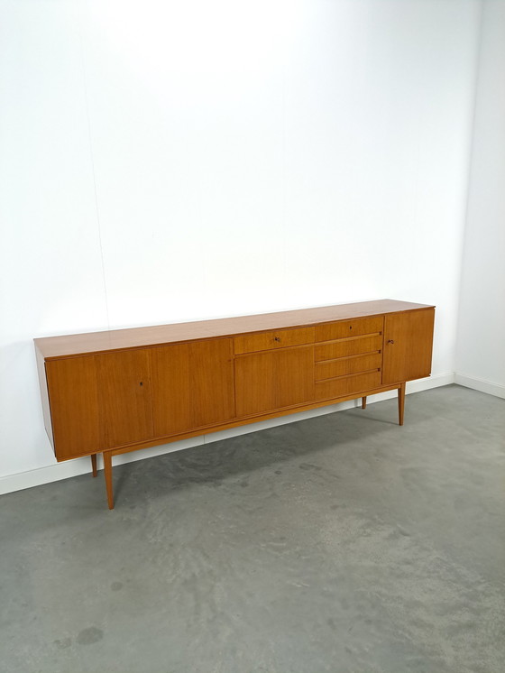 Image 1 of Lang Teak Dressoir Met Lades En Klepkast