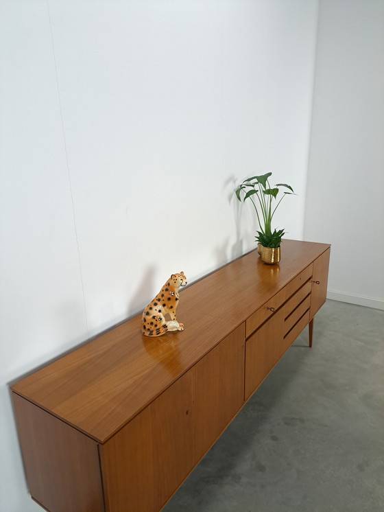 Image 1 of Lang Teak Dressoir Met Lades En Klepkast