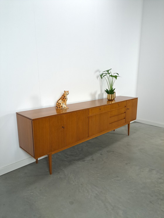 Image 1 of Lang Teak Dressoir Met Lades En Klepkast