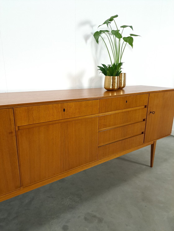 Image 1 of Lang Teak Dressoir Met Lades En Klepkast