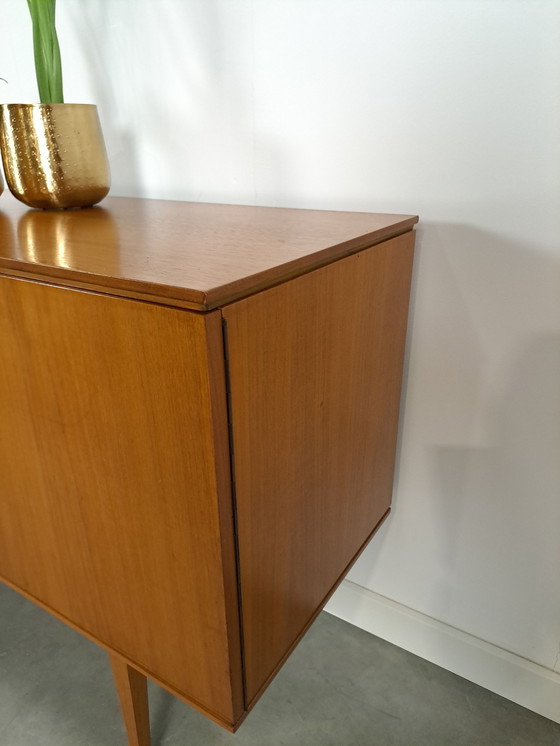 Image 1 of Lang Teak Dressoir Met Lades En Klepkast