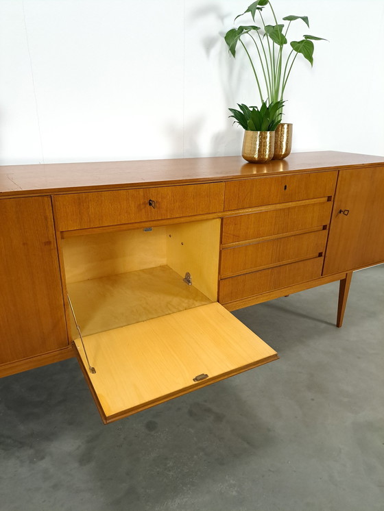 Image 1 of Lang Teak Dressoir Met Lades En Klepkast