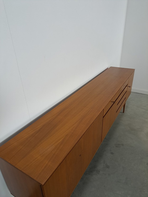 Image 1 of Lang Teak Dressoir Met Lades En Klepkast