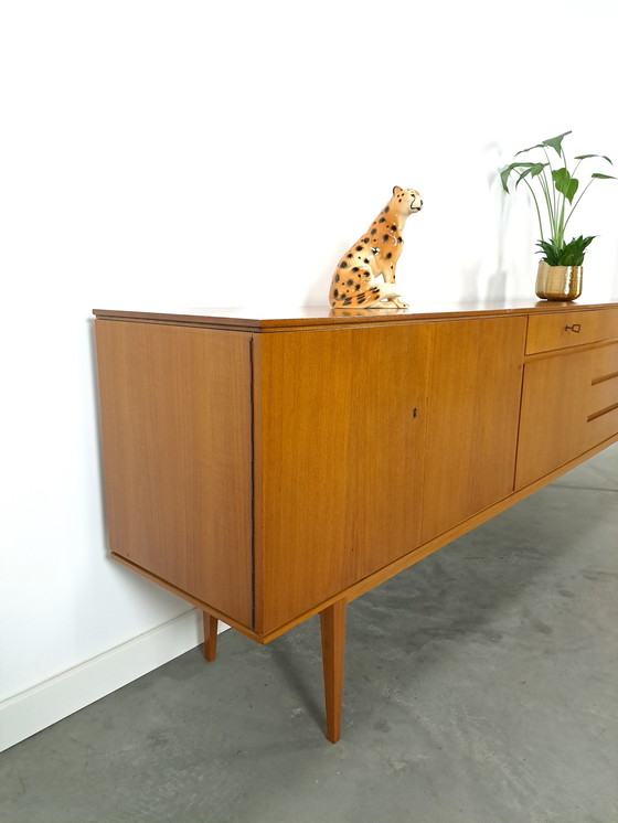 Image 1 of Lang Teak Dressoir Met Lades En Klepkast