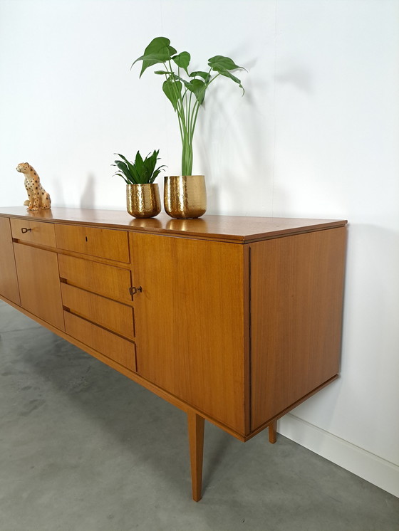 Image 1 of Lang Teak Dressoir Met Lades En Klepkast