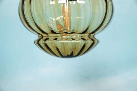 Image 1 of Vintage amber glazen hanglamp Raak Amsterdam, space age yellow glas