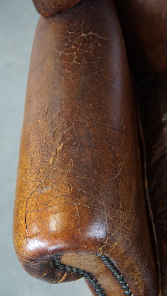 Image 1 of Grote Vintage Schapenleren Oorfauteuil