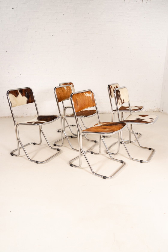 Image 1 of 6X koeienhuid lederen chromen eetkamerstoelen