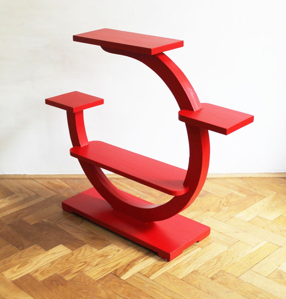 Image 1 of Rode modernistische bloemenstandaard