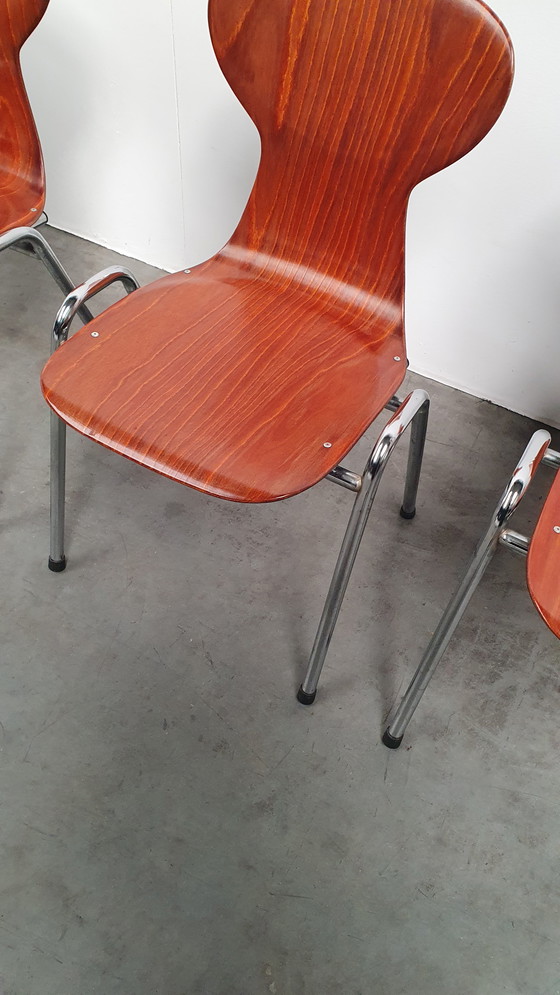 Image 1 of 4x Eromes pagholz industriële stapelbare design stoel