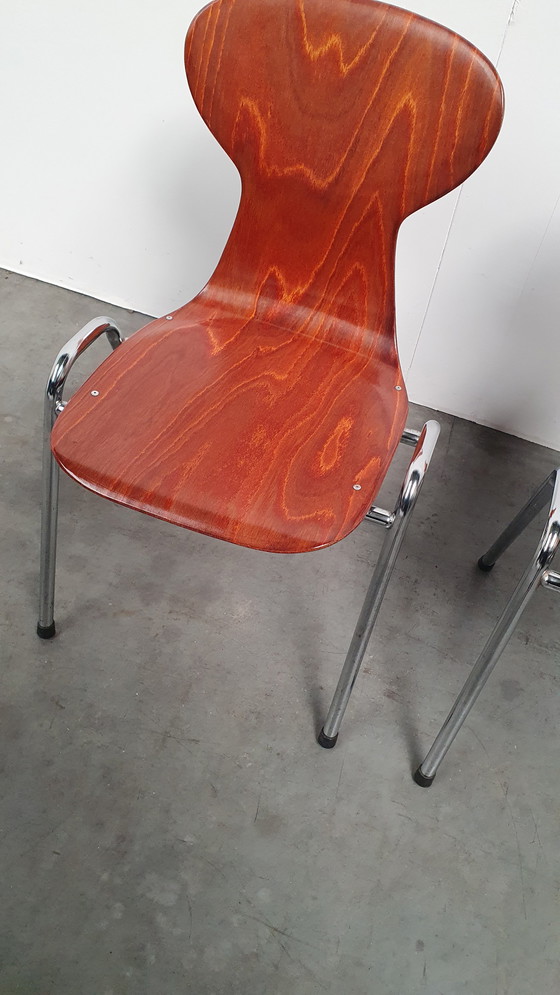 Image 1 of 4x Eromes pagholz industriële stapelbare design stoel