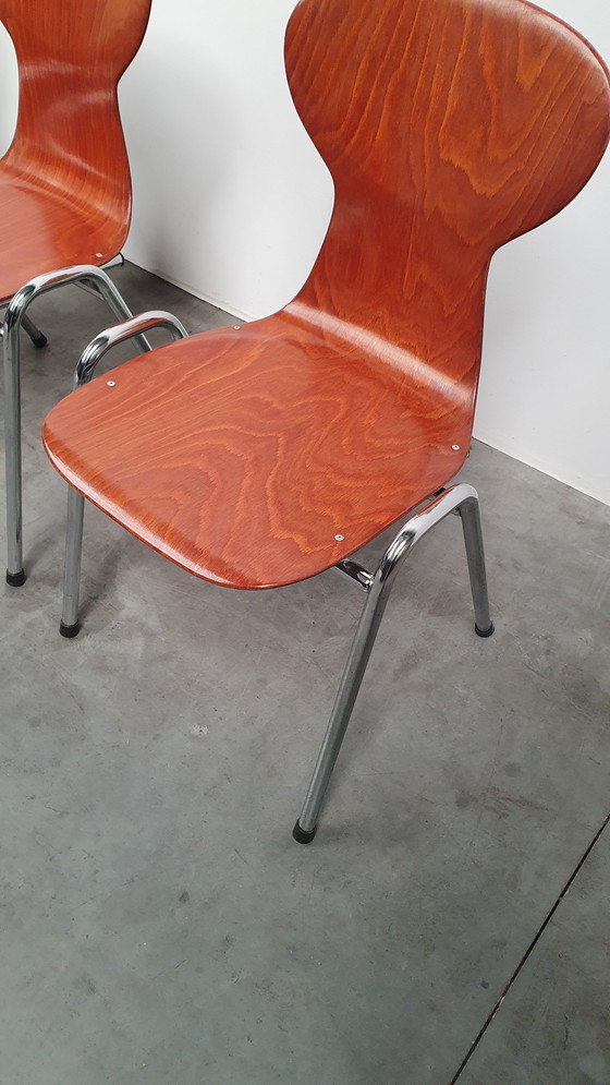 Image 1 of 4x Eromes pagholz industriële stapelbare design stoel