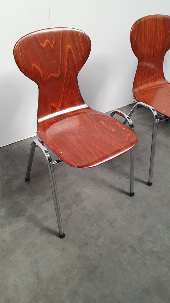 Image 1 of 4x Eromes pagholz industriële stapelbare design stoel