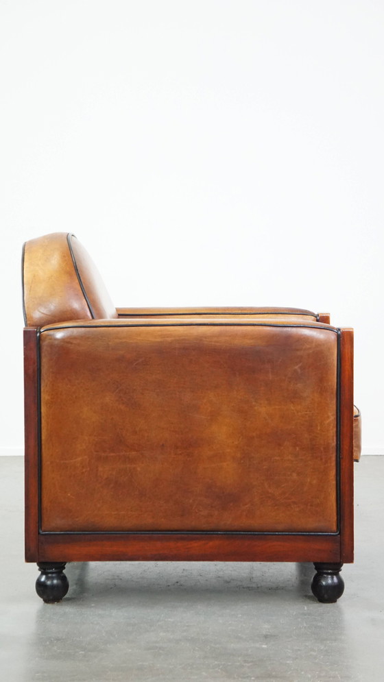 Image 1 of Schapenleren En Houten Art Deco Design Fauteuil