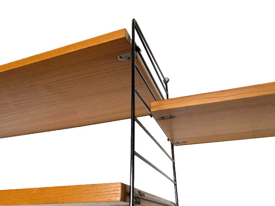 Image 1 of vintage Nisse Strinning wandsysteem met tijdschriftenrek - String design AB