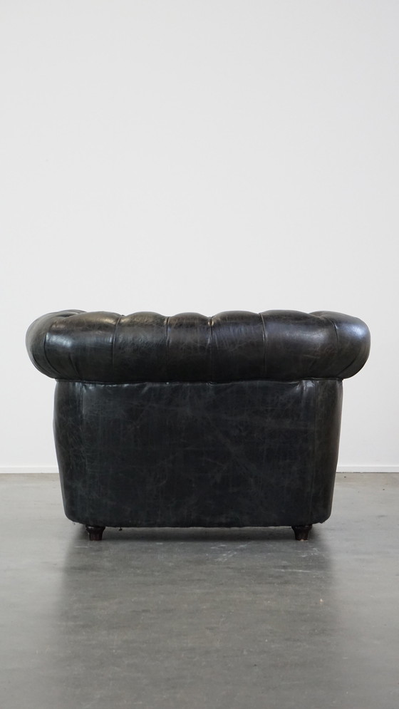 Image 1 of Zwarte Rundleren Chesterfield Fauteuil