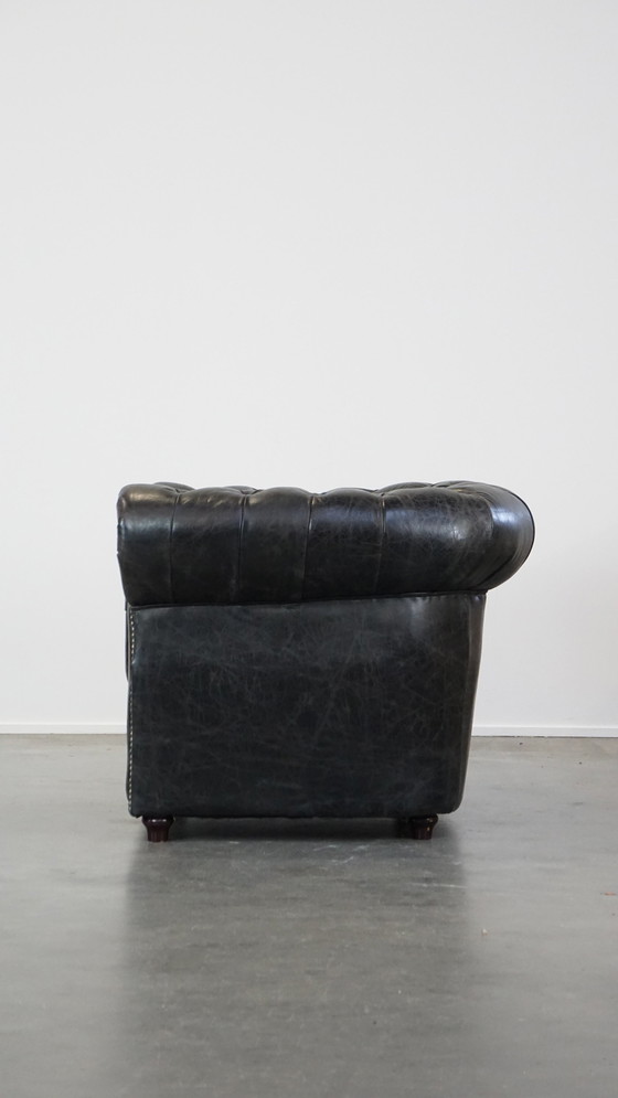 Image 1 of Zwarte Rundleren Chesterfield Fauteuil