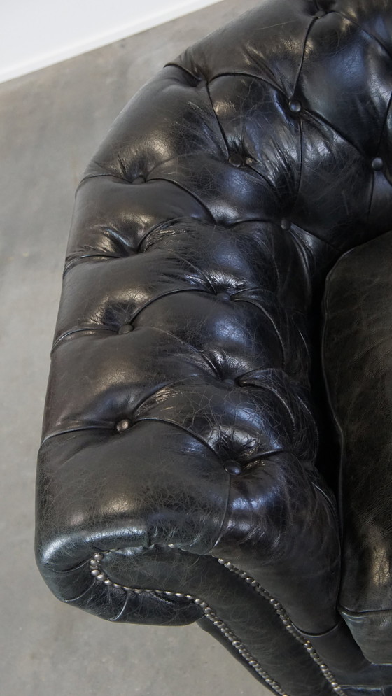 Image 1 of Zwarte Rundleren Chesterfield Fauteuil