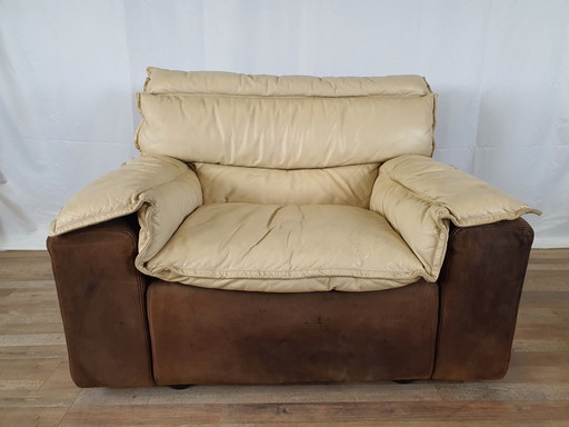 Vintage fauteuil met poef