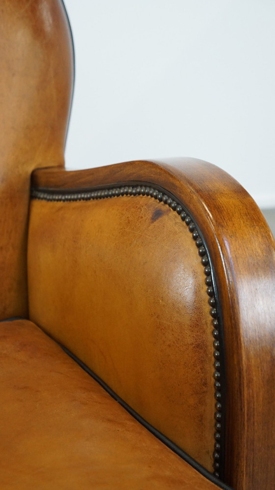 Image 1 of Schapenleren Fauteuil Gecombineerd Met Hout