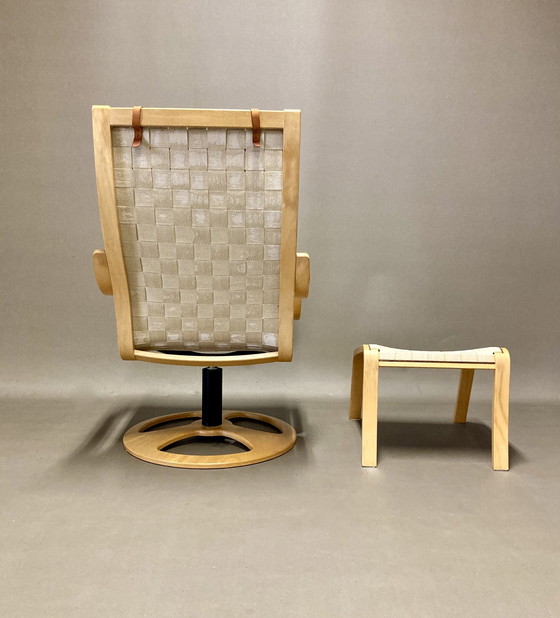 Image 1 of Scandinavische design draaifauteuil en voetenbank.