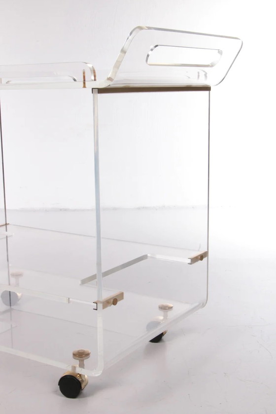 Image 1 of Italiaanse plexiglas trolley met messing details,1980