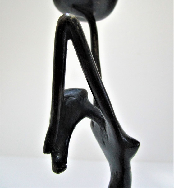 Image 1 of Gezwart bronzen kandelaar vrouw jaren 70