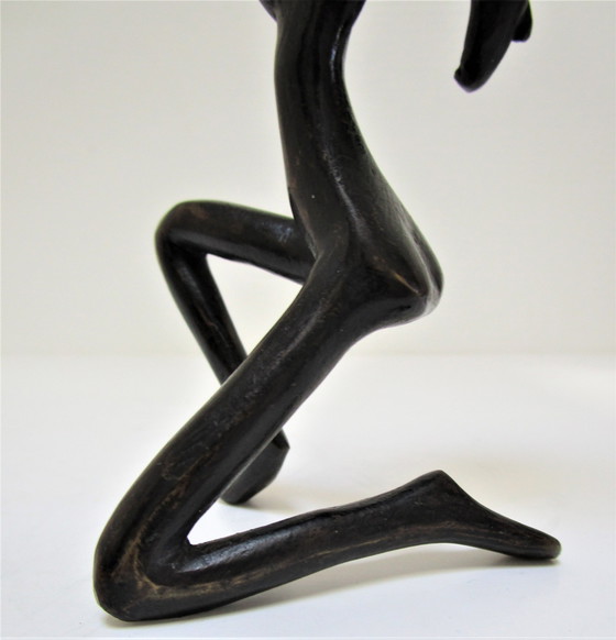 Image 1 of Gezwart bronzen kandelaar vrouw jaren 70