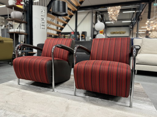 2 Leolux Scylla fauteuils Rood stof bruin leer