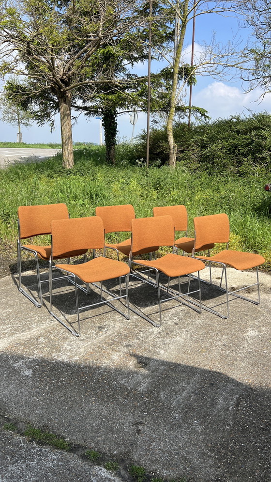 Image 1 of 7x David Rowland Howe oranje met chroom stapelbare stoelen