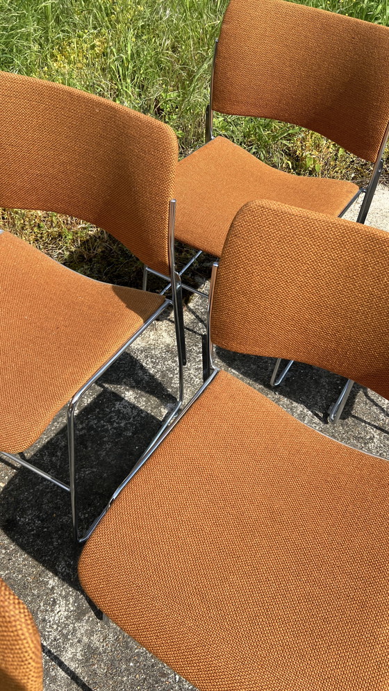 Image 1 of 7x David Rowland Howe oranje met chroom stapelbare stoelen