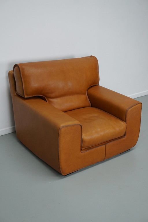 Roche Bobois clubfauteuil in tan/cognac nekleer