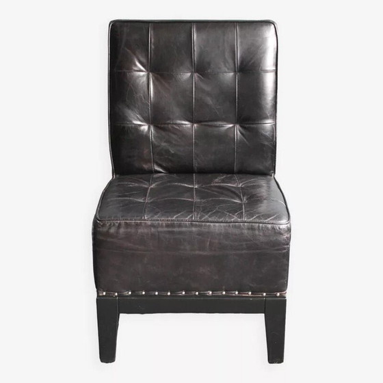 Image 1 of Zwart leren eetkamerstoel versierd met studs