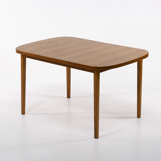 Image 1 of Scandinavische teakhouten tafel met 2 verlengstukken en 4 stoelen1960 Zweden