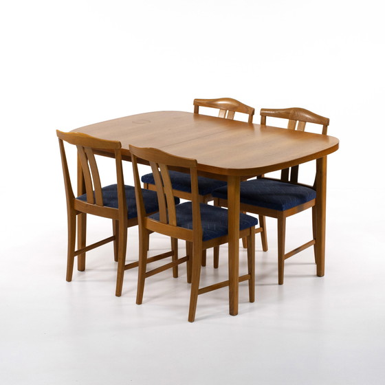 Image 1 of Scandinavische teakhouten tafel met 2 verlengstukken en 4 stoelen1960 Zweden