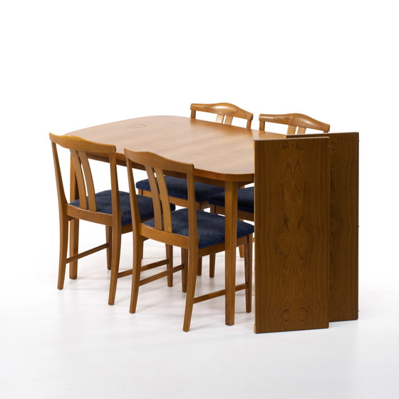 Image 1 of Scandinavische teakhouten tafel met 2 verlengstukken en 4 stoelen1960 Zweden